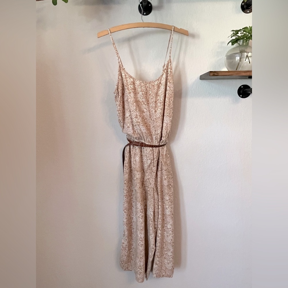 Paisley pattern lightweight 100% rayon fabric jumpsuit with adjustable straps.
